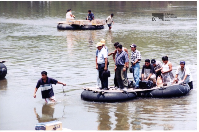 People crossing Suchiate River. 